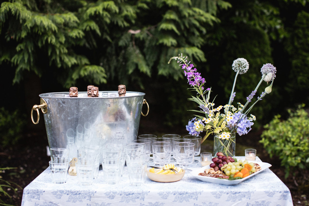 A champagne and charcuterie station in the garden of Hardie Cobb's home, all from our friends at Metropolitan Market. 