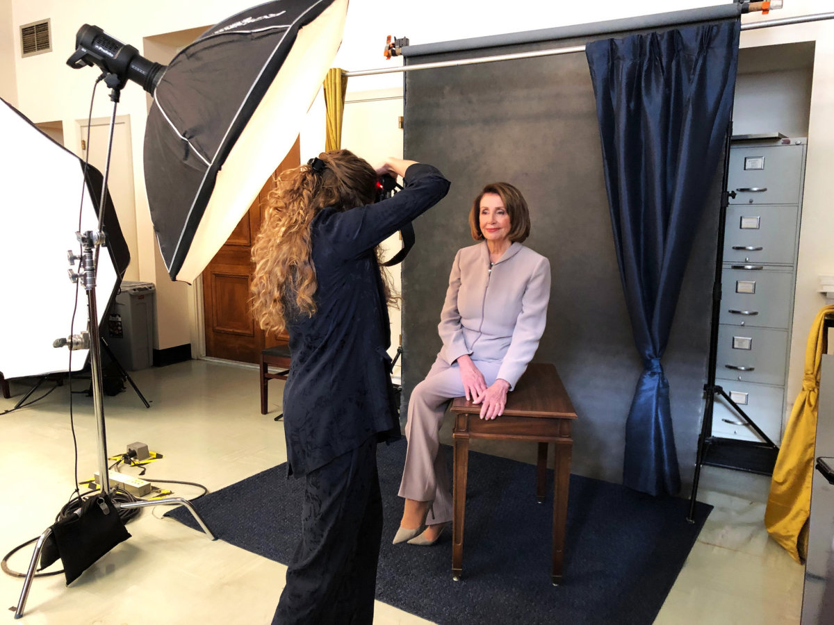 Elizabeth D. Herman, a photographer and doctoral candidate in political science, takes Speaker Nancy Pelosi’s portrait on Capitol Hill.